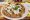 Pizza paestum con pesto, bufala e scaglie di grana
